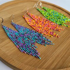 Add a playful touch to your summer style with our Summer Vibes Fringe Earrings! These zesty lime green earrings feature a fun beaded fringe, perfect for adding a pop of color to any outfit. Get ready to rock some serious summer vibes! Trendy Beaded Dangle Earrings For Festival, Trendy Dangle Beaded Earrings For Festivals, Trendy Festival Dangle Beaded Earrings, Trendy Colorful Beaded Dangle Earrings, Trendy Colorful Dangle Beaded Earrings, Trendy Summer Beaded Earrings With Dangling Beads, Trendy Beaded Earrings With Dangling Beads For Summer, Trendy Dangling Beaded Earrings For Summer, Summer Beaded Earrings With Fringe And Round Beads