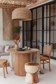 a wooden table sitting in the middle of a living room