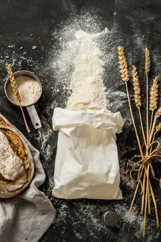 bread, flour and other ingredients on a table