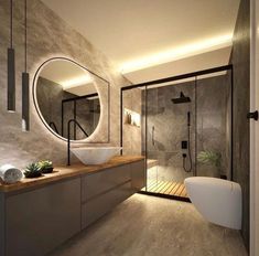 a bathroom with a sink, mirror and bathtub next to a walk in shower