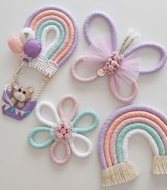 three hair clips with different colors and designs on them, one has a teddy bear