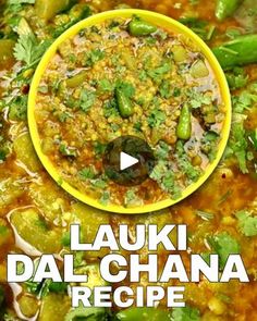 a yellow bowl filled with soup and garnished with cilantro