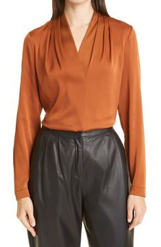 Elegant V-neck Blouse For Fall, Elegant V-neck Top For Night Out In Spring, Modern V-neck Blouse For Fall, Elegant Formal V-neck Top, Modern V-neck Blouse For Formal Occasions, Silk Tops For Night Out In Fall, Sleek Silk Blouse For Work, Sleek Silk Workwear Blouse, Sleek Viscose Blouse For Fall