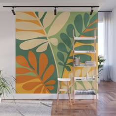 an orange, green and yellow wall mural in a living room with wooden flooring