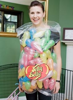 a woman holding a bag full of jelly beans