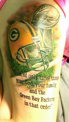 a woman with a green bay packers tattoo on her leg and the words think of only three things you're god, your family and the green bay packers in that order