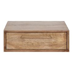 a wooden box sitting on top of a white wall next to a drawer with an open lid