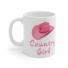 a coffee mug that says country girl with a pink cowboy hat on the front and back