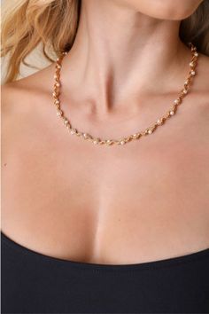 Elegance comes naturally when you style any look with the Lulus Charming Persona Gold Pearl Wavy Chain Necklace! The stylish gold-toned metal necklace features a textured, box-style chain that boasts a wavy silhouette, embellished with dainty faux pearl details positioned within the curves for an ultra-posh finish. Lobster clasp closure. Chain measure 15. 50" long. 3. 25" extender chain. 80% Glass, 20% Plated Brass. Imported. Lulus | Charming Persona Gold Pearl Wavy Chain Necklace. Circle Charm Necklace, Necklace With Pearls, Modern Gold Jewelry, Prom Season, Pearl Details, Box Chain Necklace, Diamond Necklace Set, Metal Necklace, Gold Pearl Necklace