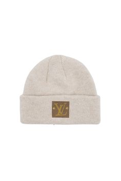 Nothing says fashion and function quite like our Upcycled LV Classic Baby Beanie! Made with 97% recycled polyester and 3% spandex, and topped with upcycled Louis Vuitton materials, this one-size-fits-most beanie is the perfect way to head out in style with mom and dad! Disclaimer: Embellish Your Life is not affiliated or associated with Louis Vuitton or Gucci or its subsidiaries. We buy authentic, vintage, pre-owned designer material obtained legally from the second-hand market and add our desig White Casual Beanie For Outdoor, Trendy Adjustable White Beanie, Trendy Fitted White Beanie, Trendy Warm White Beanie, Trendy White Beanie, Trendy White Beanie One Size, Warm White Beanie For Outdoor, Warm Fitted White Beanie, White Fitted Warm Beanie