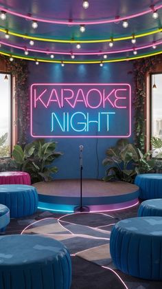 the karaoke night stage is lit up with neon lights and round blue stools