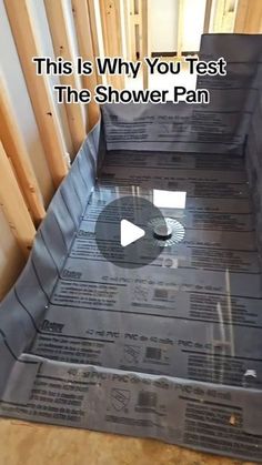 the shower pan is being installed on the floor