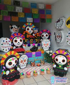 a table topped with lots of stuffed animals