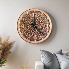 a living room with a couch and a clock on the wall