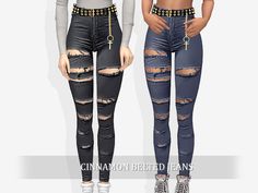 two women in jeans with chains on them