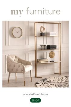 a white chair sitting in front of a book shelf