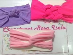 three different types of hair bows on display