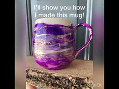 a purple coffee mug sitting on top of a piece of wood with the words, i'll'll show you how i made this mug