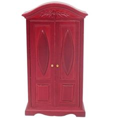 a red wooden cabinet with two doors