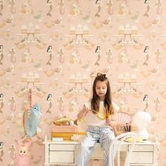 At the bottom of the ocean in their own kingdom mermaids swim amongst turtles dolphin and coral. Seen here in the Sweet Pink colourway. Mermaid Toddler Room, Mermaid Wallpaper, Angel Strawbridge, Walker Wallpaper, The Bottom Of The Ocean, Mermaid Nursery, A Street Prints, Jungle Wall, Mulberry Home