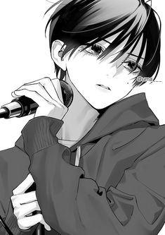 an anime character holding a microphone in one hand and looking at the camera while wearing a hoodie