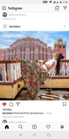 an instagram page with a woman sitting on a balcony in front of a building