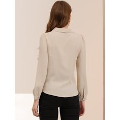 Whether you're in the office or out on the town, this cute blouse is perfect for any occasion. The soft fabric will keep you comfy all the time. Simple and classic shirts are never out of date and maintain an elegant appearance. The stylish Peter Pan collar and bow-tie neck design are different from those of classic shirts, adding a unique feminine. A classic blouse goes well with everything. It can be dressed up with dress pants or casual with skinny jeans or plaid skirts to show the preppy sty Puff Sleeve Shirt For Work, Puff Sleeve Shirt With Button Closure For Work, Long Sleeve Tops With Button Closure For Work, Long Sleeve Tops With Button Closure For Office, Long Sleeve Blouse With Back Button Closure For Fall, Puff Sleeve Padded Blouse For Work, Long Sleeve Button Blouse For Office, Fall Office Tops With Collared Neckline, Long Sleeve Buttoned Tops For Workwear