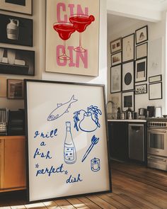 a kitchen with pictures on the wall and posters above it that read gin, free a fish, perfect drink