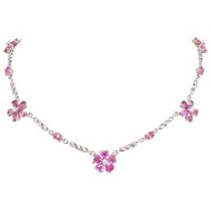 The pink sapphire and diamond necklace features 5 flowers with drop, oval and heart shaped sapphires of lovely color crystalline texture for a total weight of 16.90 carats. The design is complete with 0.49 carats of round diamonds of top quality (F/G-VVS). The necklace is one-of-a-kind. It was handmade in Italy in our own workshop by maestro Scalabrì according to an original design by Ella Gafter. The item is signed EG. Heart Shaped Gemstones, Pink Diamond Necklace 1stdibs, Luxury Pink Gold Pink Sapphire Necklaces, Luxury Pink Gold Necklaces With Pink Sapphire, Sunoo Outfit, Pink Sapphire Necklace, Pink Sapphire Jewelry, Collage Items, Sapphire Diamond Necklace