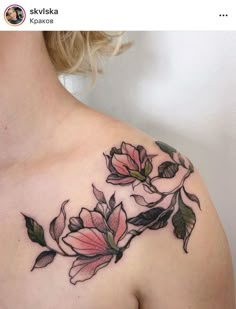 a woman's chest with flowers on it