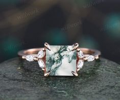 a white marble ring with diamonds on top