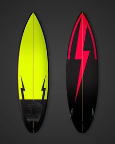 two surfboards with different designs on them, one is yellow and the other is red