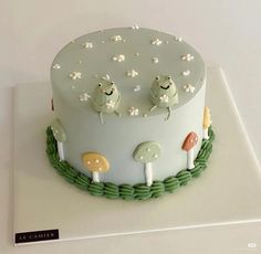 there is a cake that has mushrooms on it