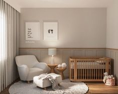 a baby's room with a chair, crib and lamp