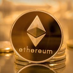 the ethereum coin is sitting on top of stacks of coins