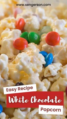 white chocolate popcorn with m & m candies in it and the words easy recipe for white chocolate popcorn