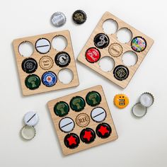 three wooden bottle openers with different types of beer cap caps on top of them