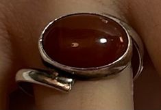 "This is a beautiful, vintage, handmade carnelian and 950 sterling silver artisan ring made by renowned jewelers Metin. The ring is a size 6 1/2 and could easily be resized by a jeweler if needed smaller or larger.  The ring face measures about 3/8\" by 5/8\". The oval-cut carnelian stone is set in a polished sterling silver bezel. The ring has an Art Deco feel to it and is very pretty. The ring is stamped Metin 950.  950 sterling silver is 95 percent silver compared to 925, which is only 92.5 percent silver. Metin jewelers is one of the premiere jewelry shops in Turkey. The ring weighs about 3.4 grams.  Very pretty. See pictures for details.  More gorgeous jewelry here, and some on BIG clearance in my shop:  http://www.etsy.com/shop/BargainBitz Please note: I have a no-questions-asked ret The Ring Face, Mother Christmas Gifts, Artisan Rings, Hippy Gifts, Carnelian Stone, Southwestern Jewelry, Pretty Earrings, Gorgeous Jewelry, Fire Opal