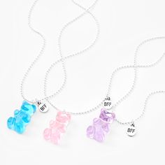 Celebrate your friendships with these sweet Gummy Bears® necklaces. The set includes three silver-tone chain necklaces, each featuring translucent pastel Gummy Bears® pendant and a "BFF" charm. It's the perfect gift to share with you and your besties! Pack Size: 3 Finish: Silver-tone Length: 16" + 3" extender Closure: Lobster clasp Material: Plastic, Metal - Claire's Best Friends Gummy Bears® Pendant Necklaces - 3 Pack Apple Watch Bands Fashion, Bff Jewelry, Bff Bracelets, Barbie Doll Set, Best Friend Bracelets, Pretty Jewelry Necklaces, Bff Necklaces, Best Friend Jewelry, Best Friend Necklaces