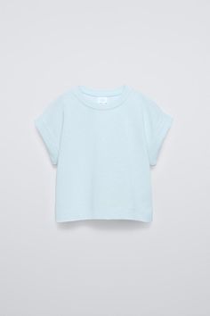 CUFFED SLEEVE T-SHIRT - Blue / Green | ZARA United States Trendy Relaxed Fit T-shirt With Cap Sleeves, Summer T-shirt With Ribbed Neckline, Spring Cotton Cap Sleeve Top, Spring Cotton Top With Cap Sleeves, Trendy Summer Short Sleeve Top With Ribbed Neckline, Trendy Short Sleeve Top With Ribbed Neckline For Summer, Cotton T-shirt With Rolled Sleeves And Crew Neck, Summer T-shirt With Ribbed Neckline And Short Sleeves, Summer Relaxed Fit Short Sleeve Top With Ribbed Neckline