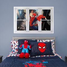 a spiderman themed bedroom with two windows