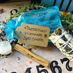 an assortment of spices and herbs on a table with the price tag labeled production wikmade spell candles