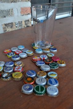 a table topped with lots of bottle caps