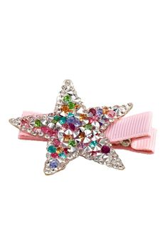 A star fit for your little rock princess! This star clip will make any hairdo glow and shine with fun studded gems and glitter accents. The clip is covered with a grosgrain pink ribbon for comfort! Dimensions: 4.5x5.5x0.5cm Star Hair Clips, Rock Princess, Glow Stars, Bear Card, Pokemon Plush, Star Hair, Chamomile Flowers, American Airlines, Kids Jewelry