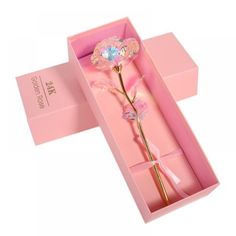 a pink box with a flower in it