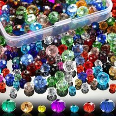 many different colored stones in a plastic container