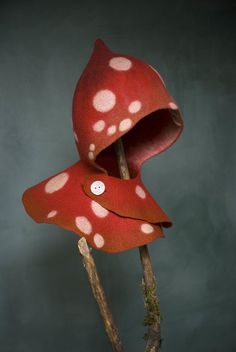 a red flower with white dots on it