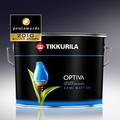 a can of paint with a blue flower on the side and a silver award sticker above it