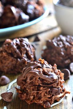 chocolate cookies are stacked on top of each other and drizzled with chocolate