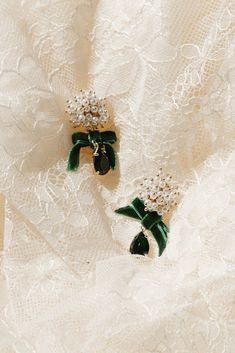 The perfect holiday accessory! Introducing our stunning Velvet Bow and Pearl Drop Earrings. Featuring a cluster of lustrous pearls at the stud, an emerald velvet bow, and a dangling teardrop crystal, these lightweight earrings are the perfect combination of classic and playful. Post with bullet clutch back for easy and secure wear. Emerald Velvet, Fairytale Party, Ribbon Earrings, Earrings Emerald, Green Accessories, White Dress Party, Lightweight Earrings, Shoe Gifts, Velvet Bow